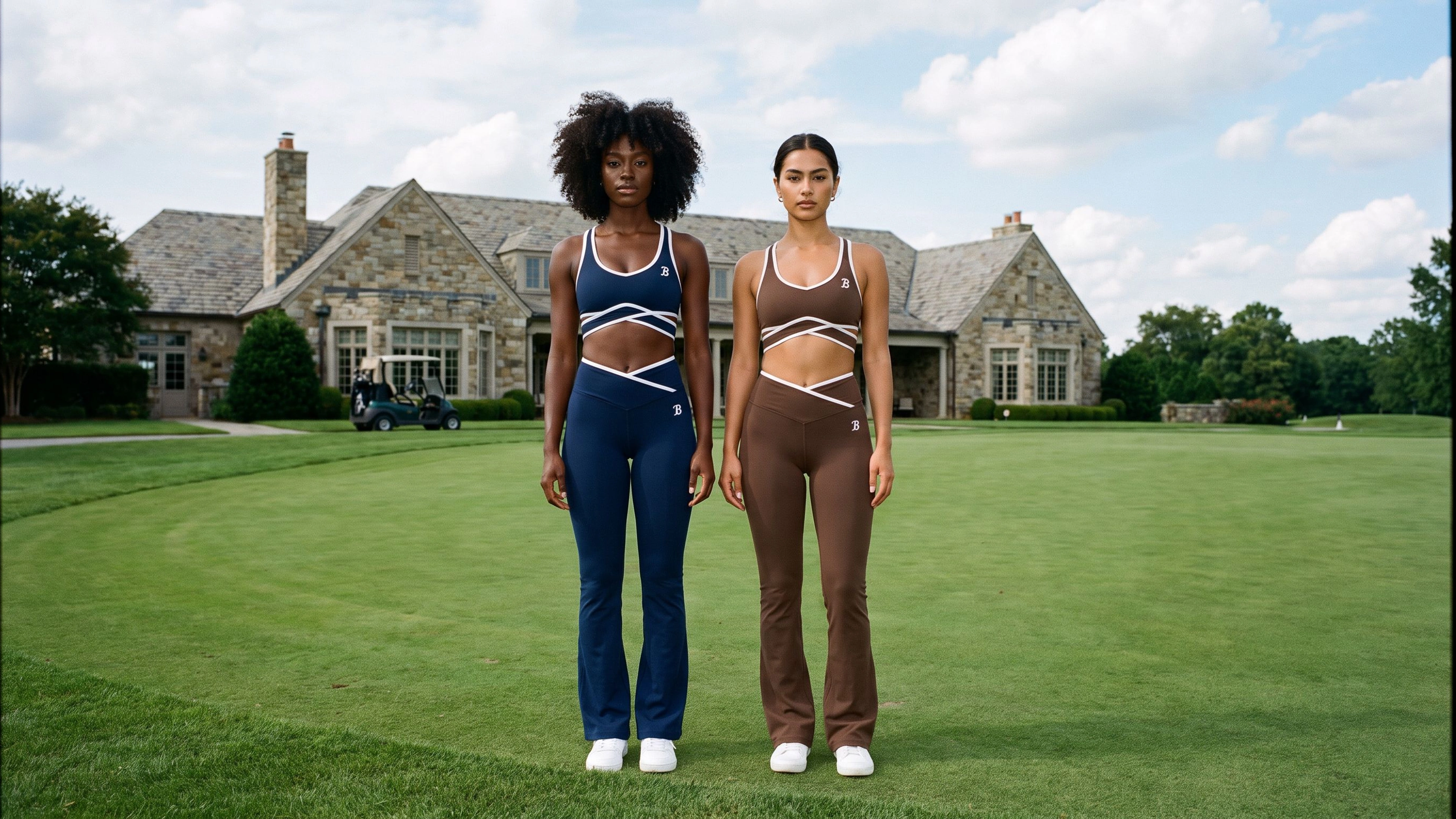 Two women model navy and coffee Ball Players sets on a private golf estate.